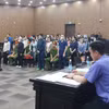 Có 36 bị cáo tại phiên tòa, 2 bị cáo Nguyễn Đăng Thuyết và Nguyễn Thị Hòa hiện đang trốn truy nã, bị đưa ra xét xử vắng mặt. (Nguồn: Báo Đầu tư)