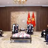 Tổng Bí thư, Chủ tịch nước Tô Lâm tiếp Ủy viên Bộ Chính trị, Phó Thủ tướng, Bộ trưởng Bộ Tư pháp Lào Khamphan Phommathat. (Ảnh: Thống Nhất/TTXVN)