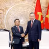 Tổng Bí thư, Chủ tịch nước Tô Lâm tiếp Ủy viên Bộ Chính trị, Phó Thủ tướng, Bộ trưởng Bộ Tư pháp Lào Khamphan Phommathat. (Ảnh: Thống Nhất/TTXVN)