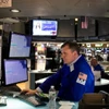 Giao dịch viên tại Sàn giao dịch chứng khoán New York, Mỹ. (Ảnh: THX/TTXVN)