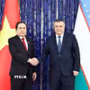 Chủ tịch Hạ viện Uzbekistan Nuriddinjon Ismailov đón Chủ tịch Quốc hội Trần Thanh Mẫn. (Ảnh: Doãn Tấn/TTXVN)