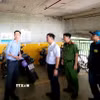 Kiểm tra an toàn cháy, nổ tại khu sạc pin xe điện tại chung cư Jamona City. (Ảnh: Linh Sơn/TTXVN)