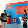 Bà Nguyễn Thị Phương Thảo, thành viên Tổ bầu cử số 1, phường Xuân Hòa, Thành phố Hồ Chí Minh từng có 4 lần tham gia công tác chuẩn bị cho bầu cử tại địa phương. (Ảnh: Hữu Duyên/TTXVN)