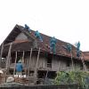 Thống kê toàn tỉnh Nghệ An có 750 nhà dân bị hư hỏng. (Ảnh: Văn Tý/TTXVN)