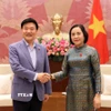 Phó Chủ tịch Quốc hội Nguyễn Thị Thanh với Giáo sư Kim Hak-Min, Chủ tịch Hội đồng Tư vấn thẩm định đạo đức Quốc hội của Hàn Quốc. (Ảnh: An Đăng/TTXVN)