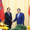Thủ tướng Phạm Minh Chính hội kiến Chủ tịch Đảng Nhân dân Campuchia Hun Sen. (Ảnh: Dương Giang/TTXVN)