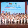 Tiết mục nhạc kèn do Đội Nghi lễ Nhà Thiếu nhi Thành phố Hồ Chí Minh biểu diễn tại lễ bế mạc liên hoan thiếu nhi 3 nước Việt Nam-Lào-Campuchia. (Ảnh: Trung Tuyến/TTXVN)