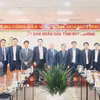 Lãnh đạo tỉnh Bình Dương cùng Tập đoàn Tokyu (Nhật Bản) tại buổi làm việc. (Ảnh: TTXVN phát)
