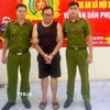 Đối tượng Nguyễn Tiến Dũng tại cơ quan Công an. (Ảnh: TTXVN phát)
