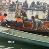 Lực lượng chức năng đã tìm thấy 6/6 nạn nhân mất tích trong vụ lật tàu. (Ảnh: TTXVN phát)