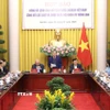 Phó Chủ nhiệm Văn phòng Chủ tịch nước Cấn Đình Tài chủ trì Họp báo. (Ảnh: An Đăng/TTXVN)