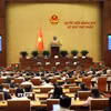 Quốc hội biểu quyết thông qua việc điều chỉnh, bổ sung Chương trình kỳ họp thứ Nhất, Quốc hội khóa XVI. (Ảnh: An Đăng/TTXVN)