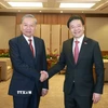 Thủ tướng Singapore, Tổng Thư ký Đảng Hành động nhân dân Singapore (PAP) Lawrence Wong đón Tổng Bí thư Tô Lâm. (Ảnh: Thống Nhất/TTXVN)