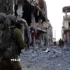 Lực lượng Phòng vệ Israel (IDF)thực hiện chiến dịch tấn công vào thành phố Gaza. (Ảnh: IRNA/TTXVN)