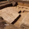 Khu vực khai quật tại di tích Mán Bạc. (Ảnh: Thùy Dung/TTXVN)