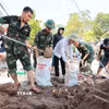Chủ động phòng chống thiên tai, bão lũ. (Ảnh: Lê Đông/TTXVN)