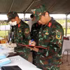 Quy trình thực hiện công tác lấy mẫu hài cốt liệt sỹ chưa được xác định thông tin được thực hiện chặt chẽ, khoa học và an toàn tuyệt đối. (Ảnh: Xuân Khu/TTXVN)
