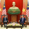 Tổng Bí thư Tô Lâm tiếp Thủ tướng Malaysia Anwar Ibrahim. (Ảnh: Thống Nhất/TTXVN)