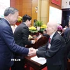 Tổng Bí thư Tô Lâm và các đại biểu tham dự buổi gặp mặt. (Ảnh: Thống Nhất/TTXVN)