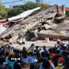 Lực lượng cứu hộ tìm kiếm nạn nhân sau trận động đất tại Cali, Colombia. (Ảnh: THX/TTXVN phát)