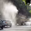 Phun nước để giảm nhiệt trên đường phố tại New Delhi, Ấn Độ. (Ảnh: ANI/TTXVN)