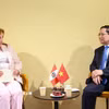 Thủ tướng Phạm Minh Chính gặp Tổng thống Peru Dina Ercilia Boluarte Zegarra. (Ảnh: Dương Giang/TTXVN)