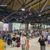 Hành khách tại sân bay Sheremetyevo hôm 6/7. (Nguồn: Telegram)