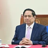 Thủ tướng Phạm Minh Chính điện đàm với Thủ tướng Malaysia Anwar Ibrahim. (Ảnh: Dương Giang/TTXVN)