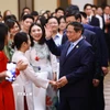 Thủ tướng Phạm Minh Chính gặp cộng đồng, lưu học sinh Việt Nam tại khu vực Bắc Kinh, Thiên Tân, Hà Bắc (Trung Quốc). (Ảnh: Dương Giang/TTXVN)