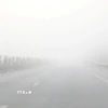 Bắc Bộ sáng sớm có sương mù. (Ảnh: Văn Đạt/TTXVN)
