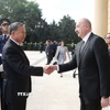 Tổng thống Azerbaijan Ilham Aliyev đón Tổng Bí thư Tô Lâm. (Ảnh: Thống Nhất/TTXVN)