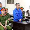 Hai bị cáo tại phiên tòa. (Ảnh: Thế Duyệt/TTXVN)