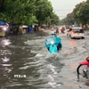 Nước ngập trên đường Đặng Thùy Trâm, quận Bình Thạnh. (Ảnh: TTXVN phát)