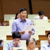 Đại biểu Quốc hội tỉnh Vĩnh Phúc Trần Văn Tiến phát biểu. (Ảnh: Phạm Kiên/TTXVN)