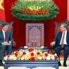 Tổng Bí thư Tô Lâm tiếp Giám đốc Học viện Tổng thống Liên bang Nga Aleksey Komissarov. (Ảnh: Thống Nhất/TTXVN)