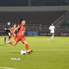Đội nữ Thành phố Hồ Chí Minh (áo đỏ) đánh bại Abu Dhabi (áo trắng). (Ảnh: Trung Tuyến/TTXVN)