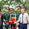Lễ viếng, truy điệu và an táng 14 hài cốt liệt sỹ tại Nghĩa trang Liệt sỹ xã Khe Sanh (tỉnh Quảng Trị). (Ảnh: TTXVN phát)