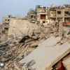 Cảnh đổ nát sau các cuộc không kích của Israel xuống Dải Gaza. (Ảnh: THX/TTXVN)