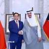 Thủ tướng Phạm Minh Chính hội đàm với Thủ tướng Nhà nước Kuwait Sheikh Ahmad Abdullah Al-Ahmad Al Sabah. (Ảnh: Dương Giang/TTXVN)