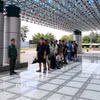 12 công dân Việt Nam do phía Campuchia trao trả tại cửa khẩu Quốc tế Hoa Lư (Đồng Nai). (Ảnh: Đậu Tất Thành/TTXVN)