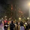 Hiện trường vụ cháy chung cư tại quận Tai Po. (Ảnh: Mạc Luyện/TTXVN)