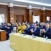 Thủ tướng Phạm Minh Chính và Chủ tịch Quốc hội Trần Thanh Mẫn cùng Đoàn đại biểu cấp cao Đảng, Nhà nước Việt Nam tham dự buổi gặp mặt. (Ảnh: Dương Giang/TTXVN)