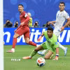 Ronaldo hoàn tất cú đúp vào lưới Uzbekistan. (Ảnh: AFP/TTXVN)