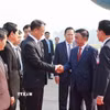 Lễ đón Thường trực Ban Bí thư Trần Cẩm Tú và Đoàn đại biểu cấp cao Việt Nam tại sân bay quốc tế Wattay, thủ đô Vientiane. (Ảnh: Phương Hoa/TTXVN)