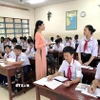 Cô và trò Trường Trung học cơ sở Gò Đen (tỉnh Tây Ninh) trong tiết học Ngữ văn. (Ảnh: Đức Hạnh/TTXVN)