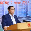 Thủ tướng Phạm Minh Chính chủ trì Hội nghị triển khai Nghị quyết của Quốc hội về thí điểm một số cơ chế, chính sách đặc thù phát triển nhà ở xã hội. (Ảnh: Dương Giang/TTXVN)