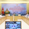 Thủ tướng Phạm Minh Chính chủ trì Hội nghị triển khai Nghị quyết của Quốc hội về thí điểm một số cơ chế, chính sách đặc thù phát triển nhà ở xã hội. (Ảnh: Dương Giang/TTXVN)