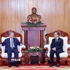Tổng Bí thư Tô Lâm gặp nguyên Tổng Bí thư, Chủ tịch nước Lào Choummaly Sayasone. (Ảnh: Thống Nhất/TTXVN)