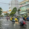 Mưa to gây ngập trên đường Cách Mạng Tháng Tám, quận Ninh Kiều, Cần Thơ. (Ảnh: Thanh Liêm/TTXVN)