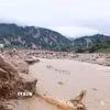 Hiện trường tan hoang sau khi cơn lũ đi qua tại xã Mường Than, tỉnh Lai Châu. (Ảnh: Quý Trung/TTXVN)